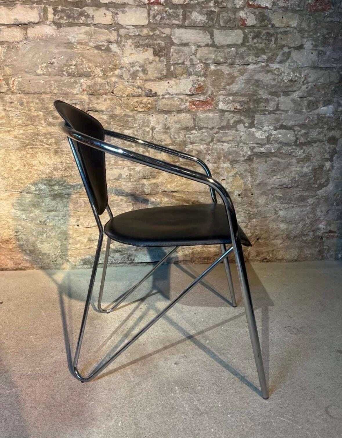 Effezeta Chairs With Black Leather Upholstery And A Chrome / Tubular Steel Frame photo Furniture