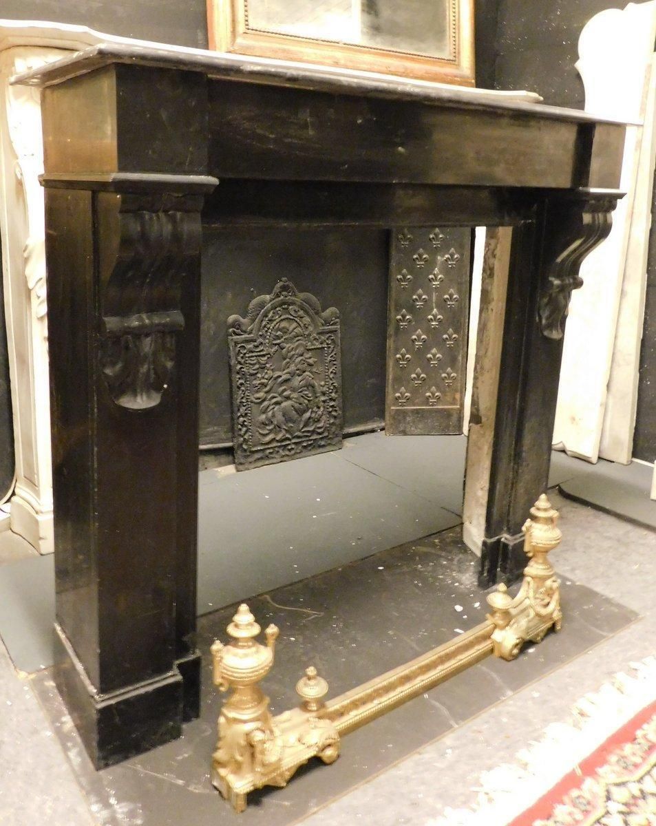 photo furniture Camino Mantello In Marmo Nero Belgio, Forma Semplice Geometrica, Francia