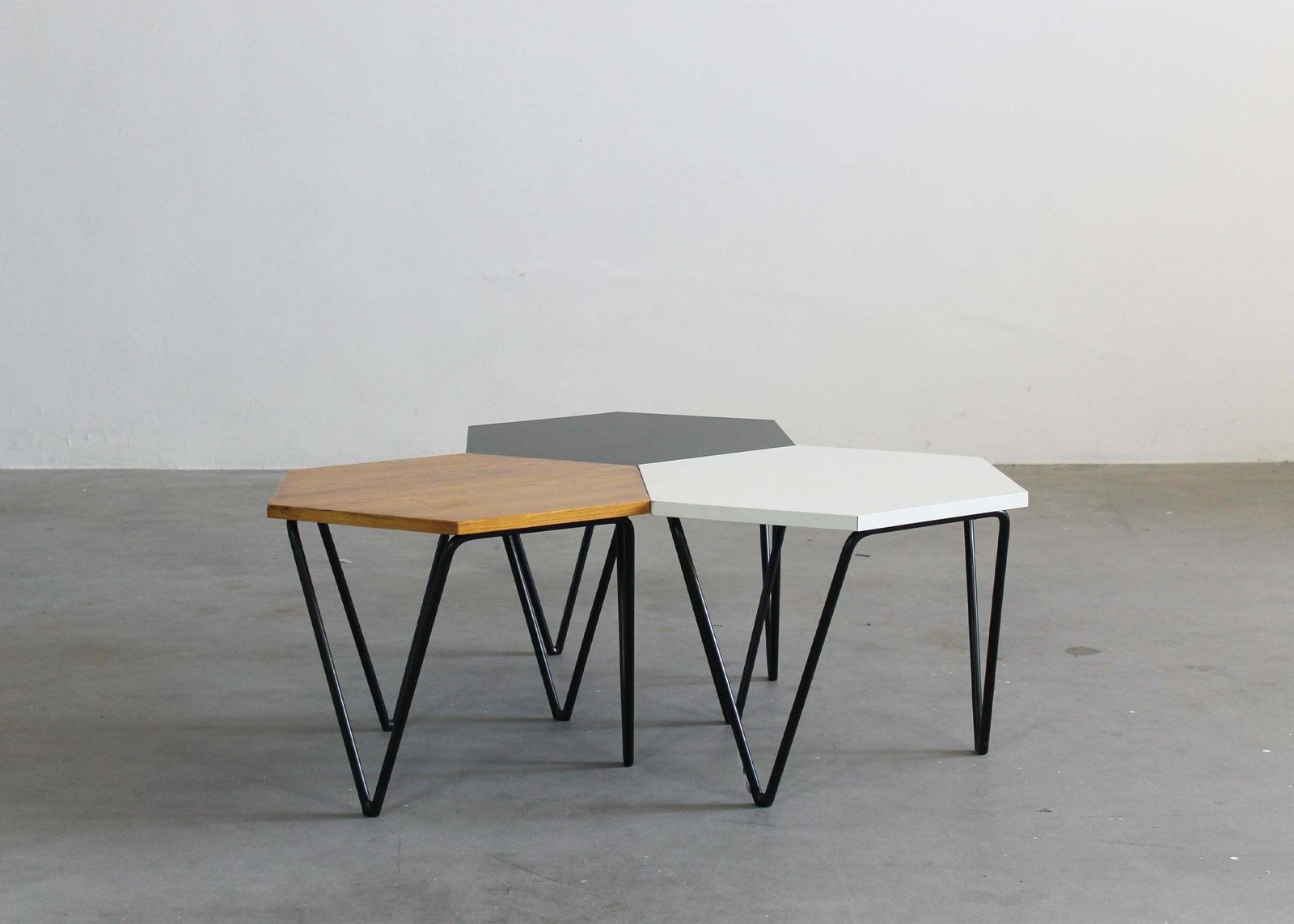 photo furniture Gio Ponti Set Of Six Hexagonal Coffee Tables In Wood And Metal I.S.A. 1950s