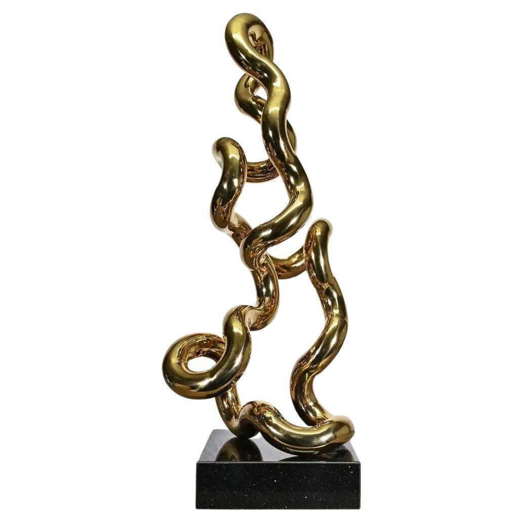 Gold Tubular Metal Sculpture On Black Base, Contemporary Style