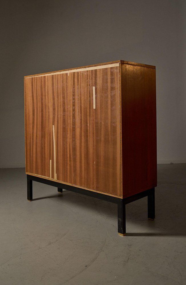 Teak Cabinet With Brass Details And Black Metal Base, 1970s photo furniture