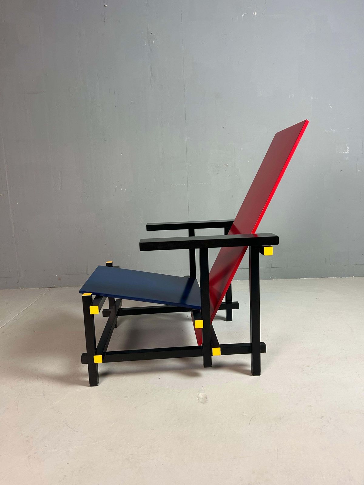 Gerrit Rietveld Red And Blue Chair By Cassina photo vinterior