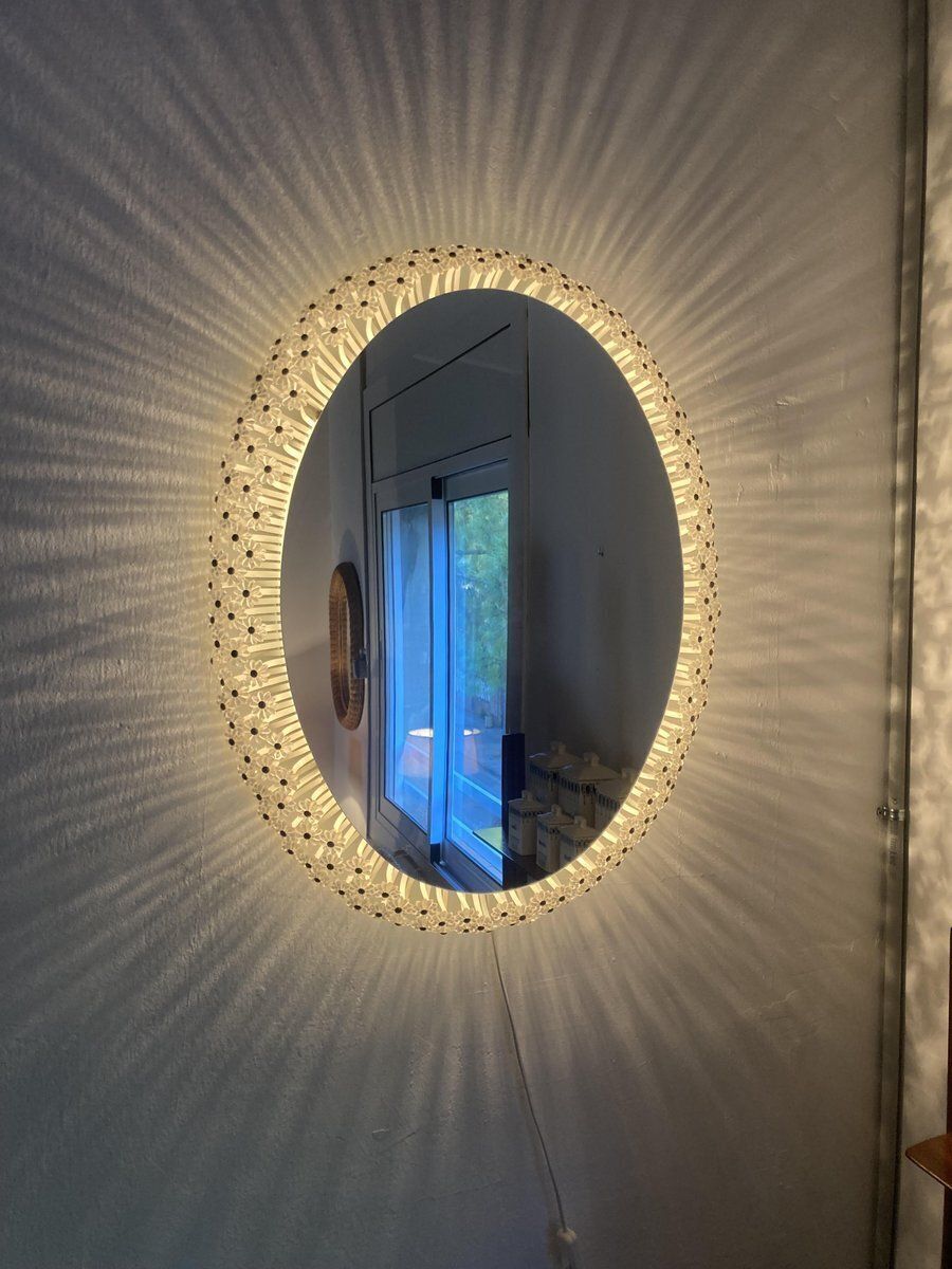 Oval Wall Mounted Floral Mirror Attributed To Emil Stejnar For Rupert Nikoll, 1950s photo for sale