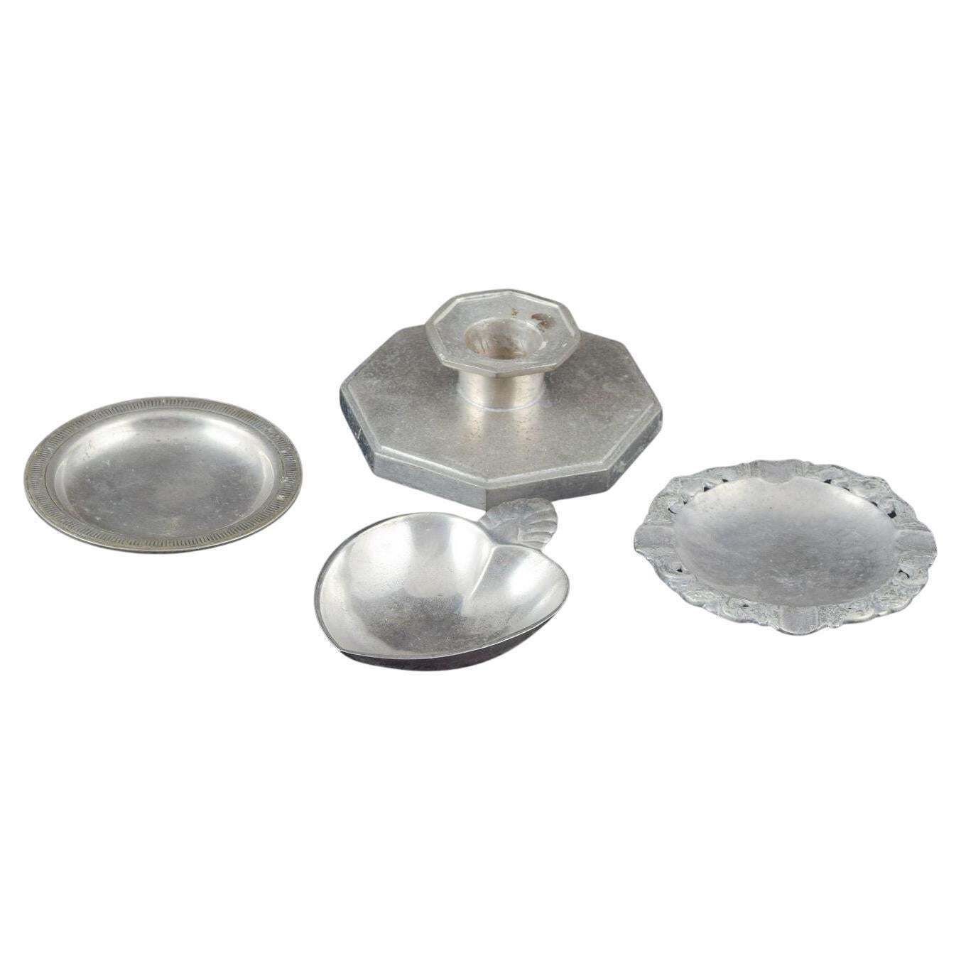 Just Andersen, Denmark. Collection Of Three Small Pewter Dishes And Candlestick.