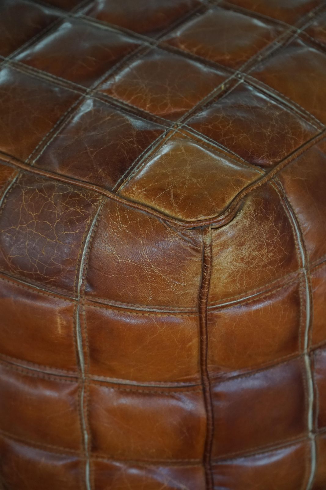 photo furniture Mid 20th Century, Cube Pouf / Ottoman In Patinated Brown Leather, 1960s