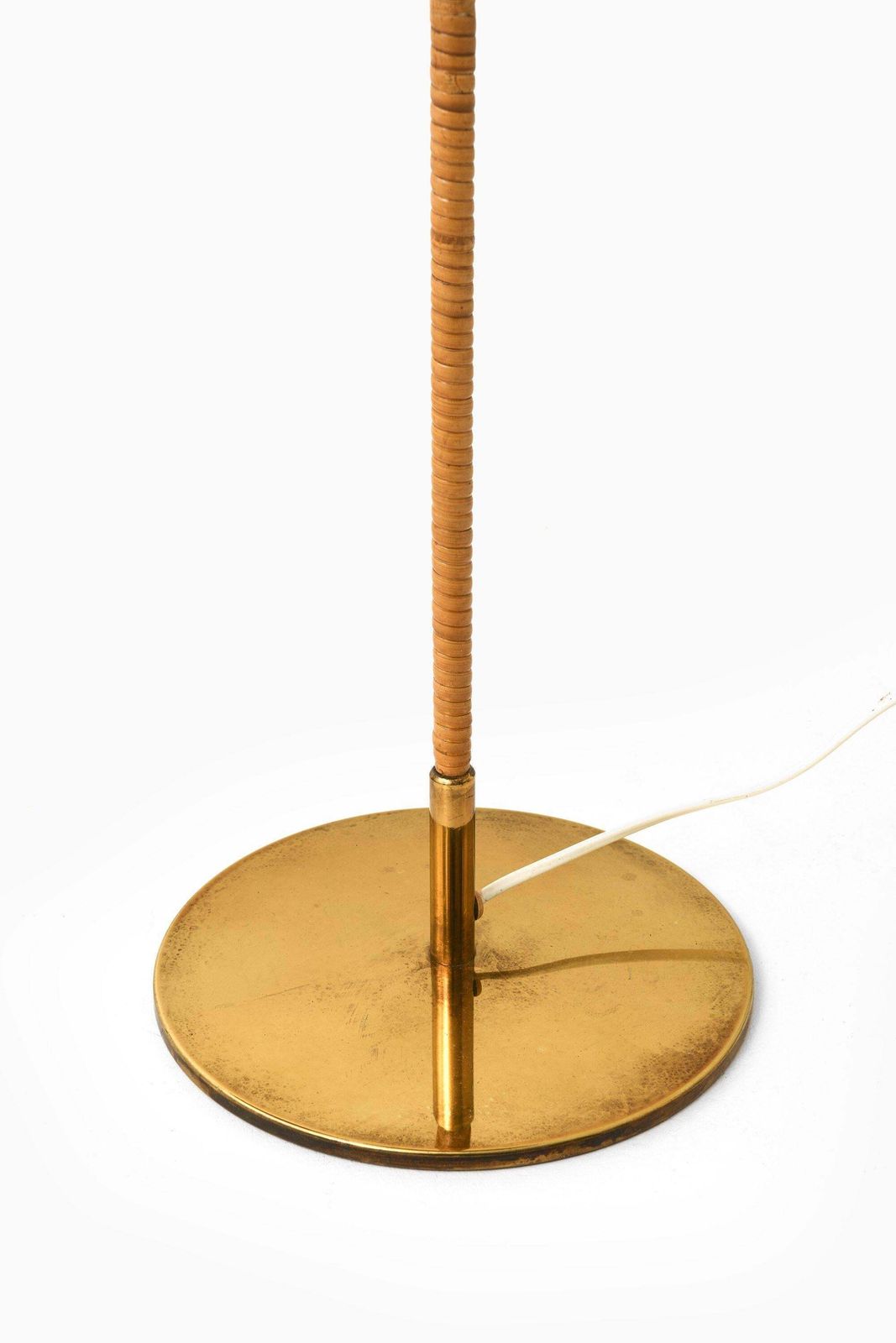82631.0 Pair Of Floor Lamps In Brass, Cane And Cane Shades By Paavo Tynell, 1950's photo