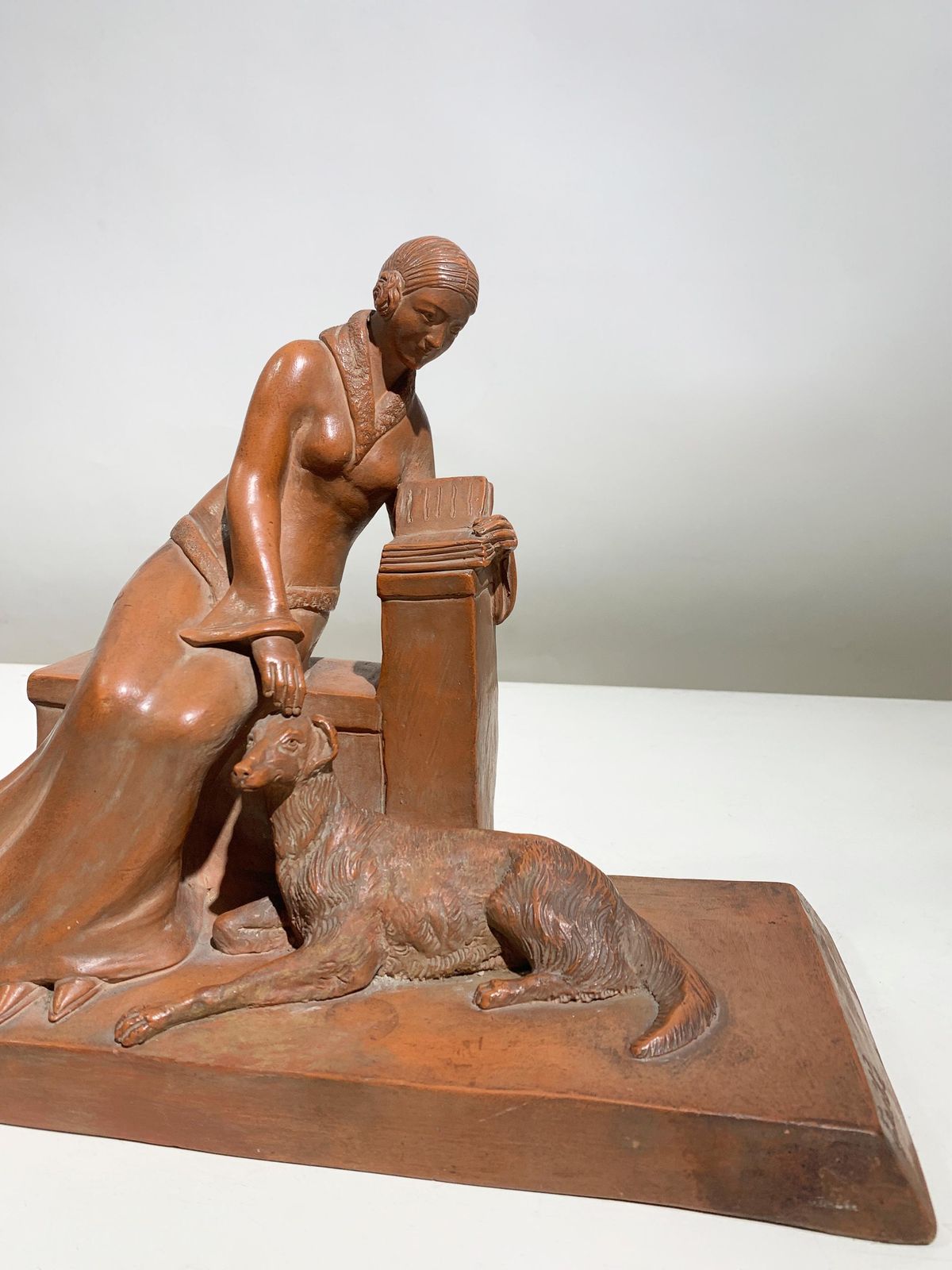 photo for sale Art Deco Terracotta Sculpture Of A Seated Woman With Dog Signed"Eribe"Circa 1930