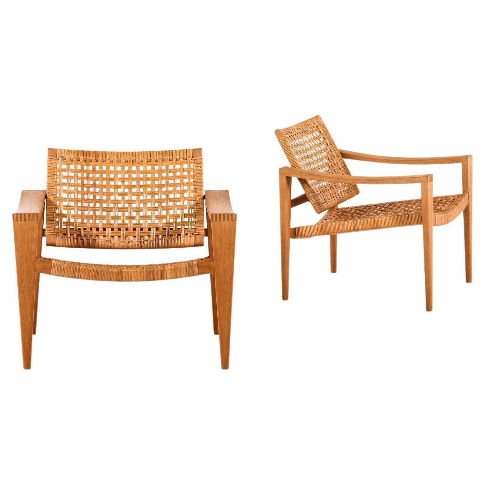 Pair Of Easy Chairs In Oak, Woven Cane, Brass And Leather By Hans Wegner, 1959