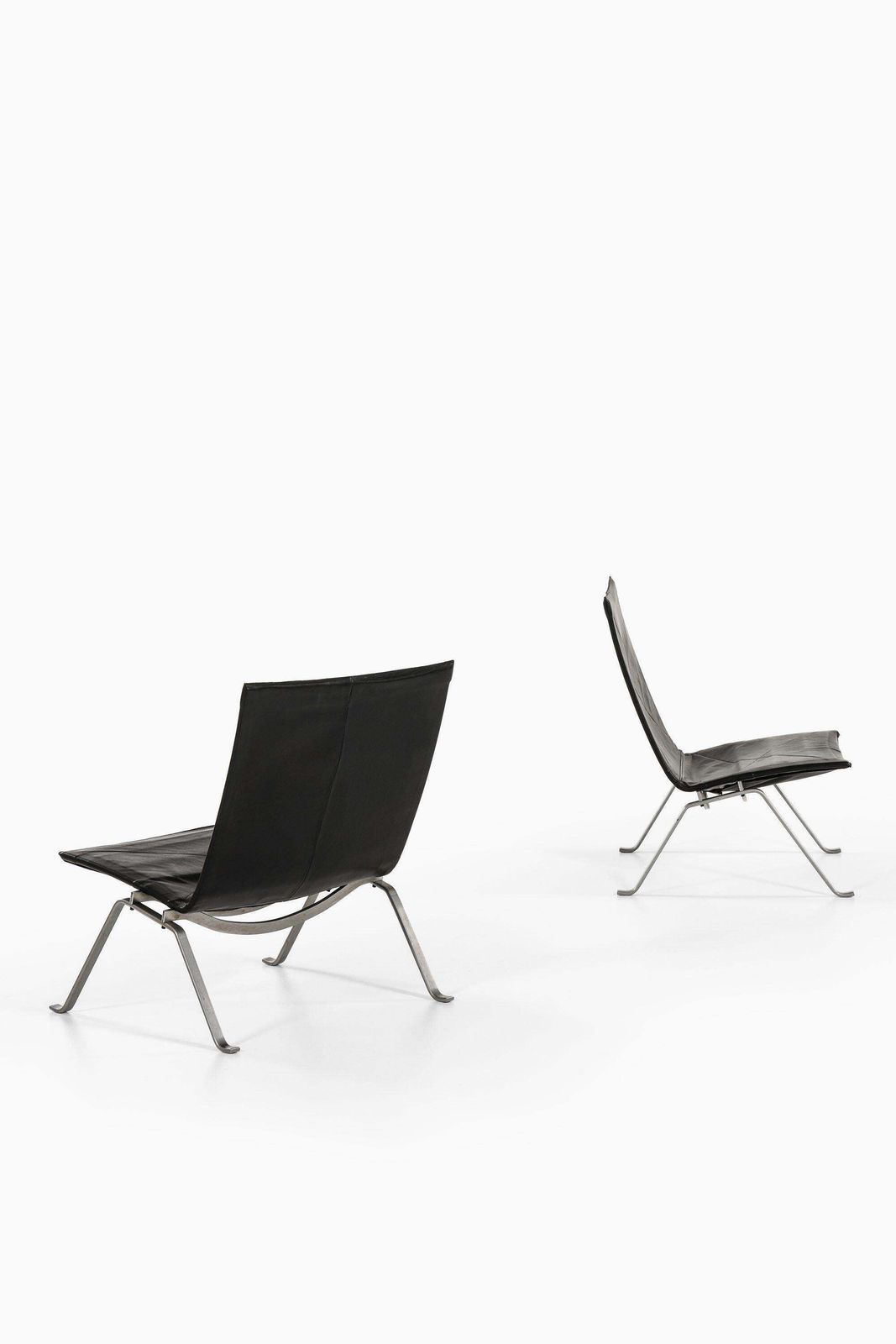 Pair Of Easy Chairs In Black Leather And Steel By Poul Kjærholm, 1950's photo Furniture