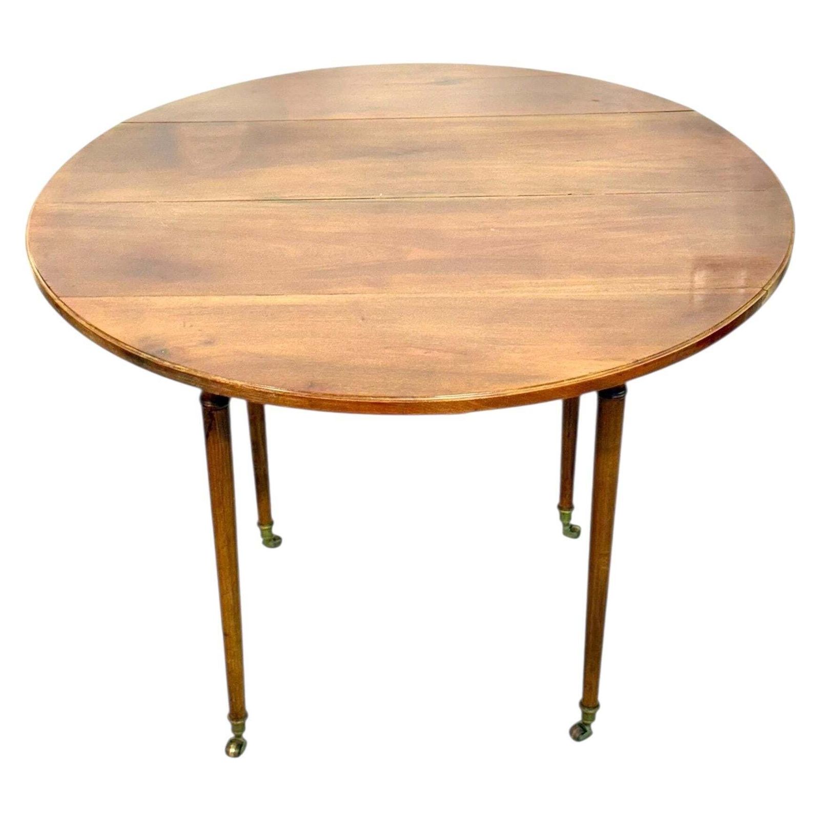 Early 19th Century French Cherrywood Drop Leaf Table On Gilt Bronze Casters