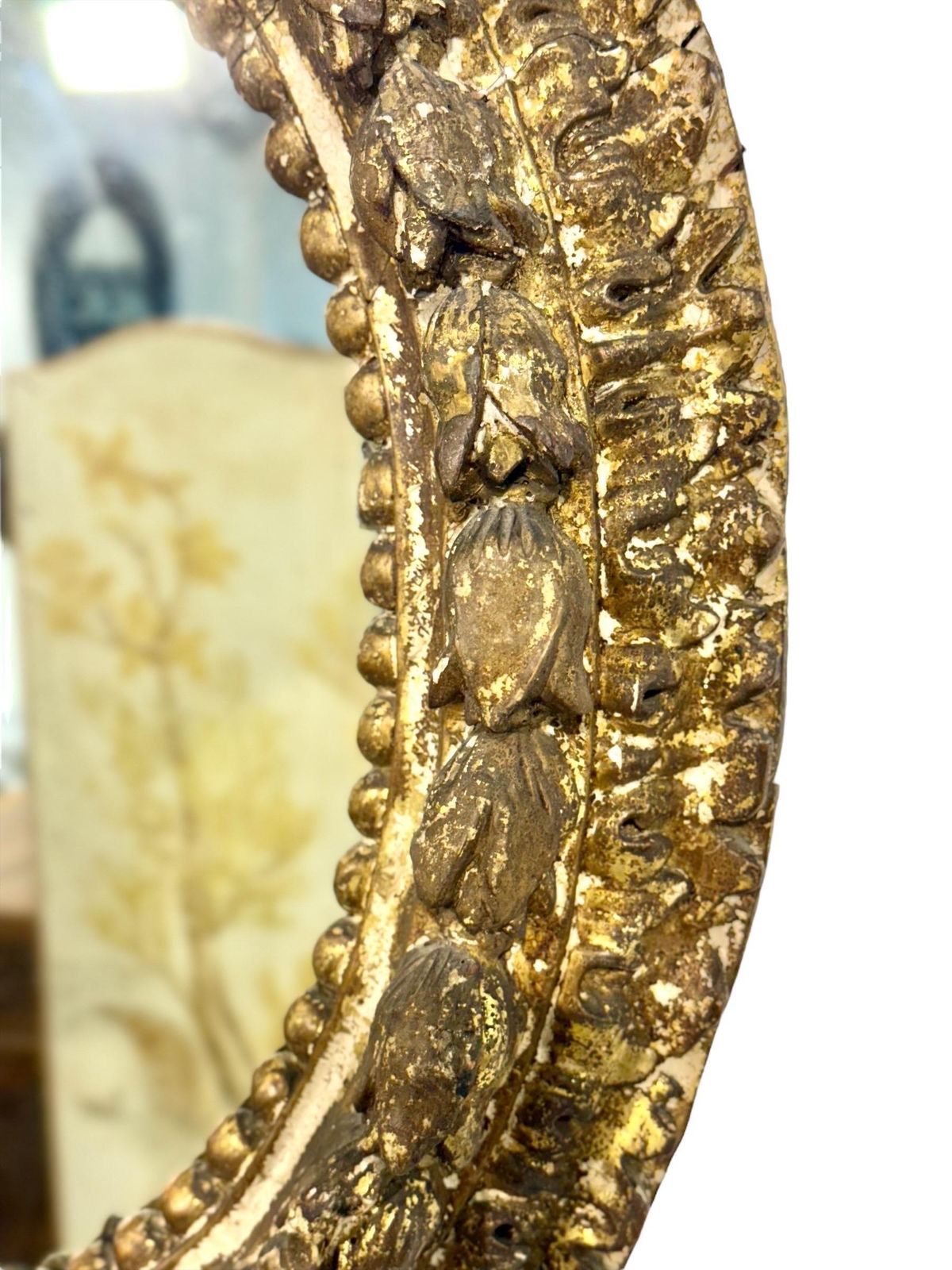 17th Century Italian Oval Giltwood Mirror With Floral Carvings photo vinterior