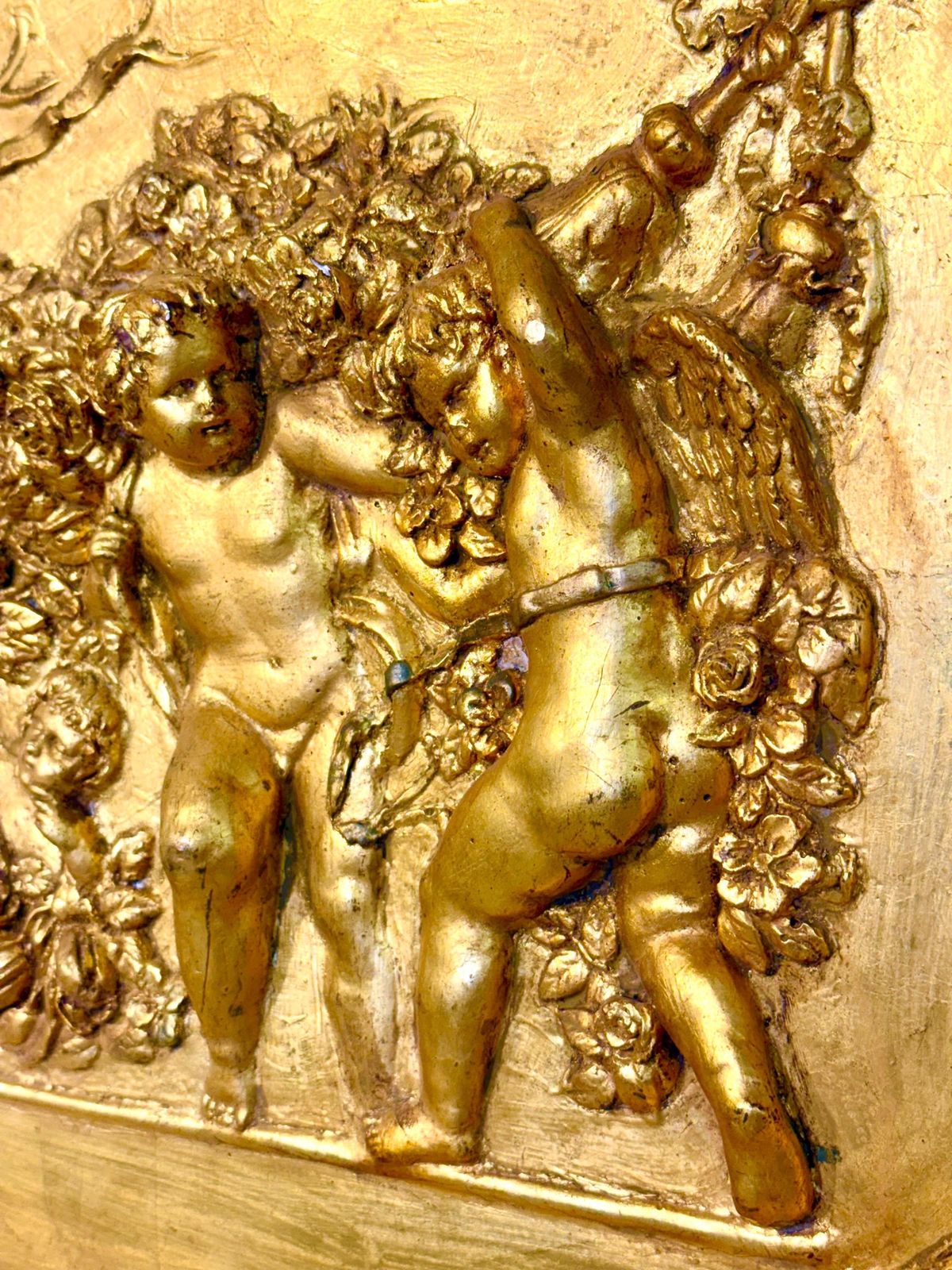 19th Century Gilded Plaster Oval Bas Relief With Putti And Garlands photo for sale
