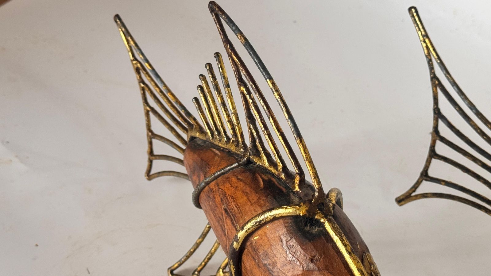 photo for sale Pair Of 1970s French Fish Sculptures – Wood And Gilded Metal Mid Century Decor