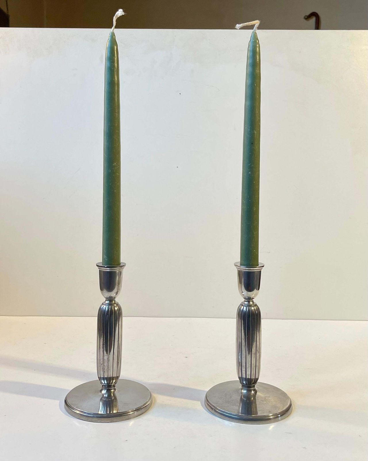 photo for sale Just Andersen   A Pair Of Art Deco Column Candlesticks In Pewter, 1930s