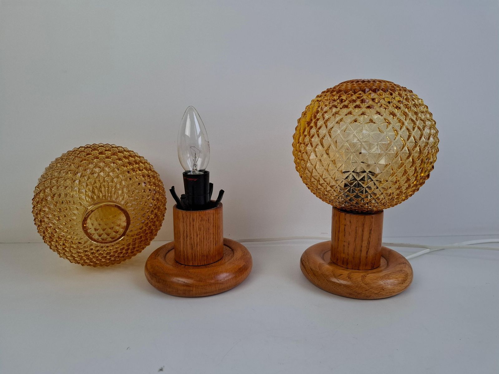 Pair Of Mid Century Table Lamps With Amber Glass And Wood Base, Czechoslovakia photo for sale
