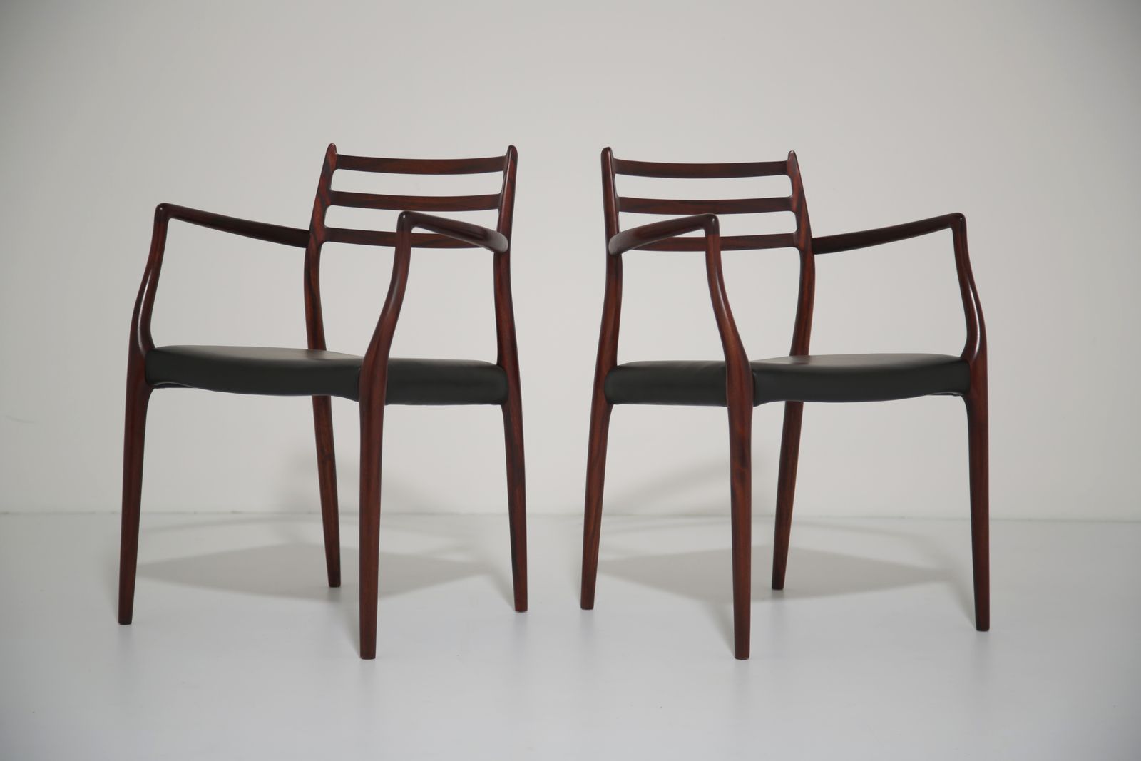photo vintage Niels Otto Møller Model 62 Carver Armchairs: Solid Mahogany For J.L. Møllers, 1960s.