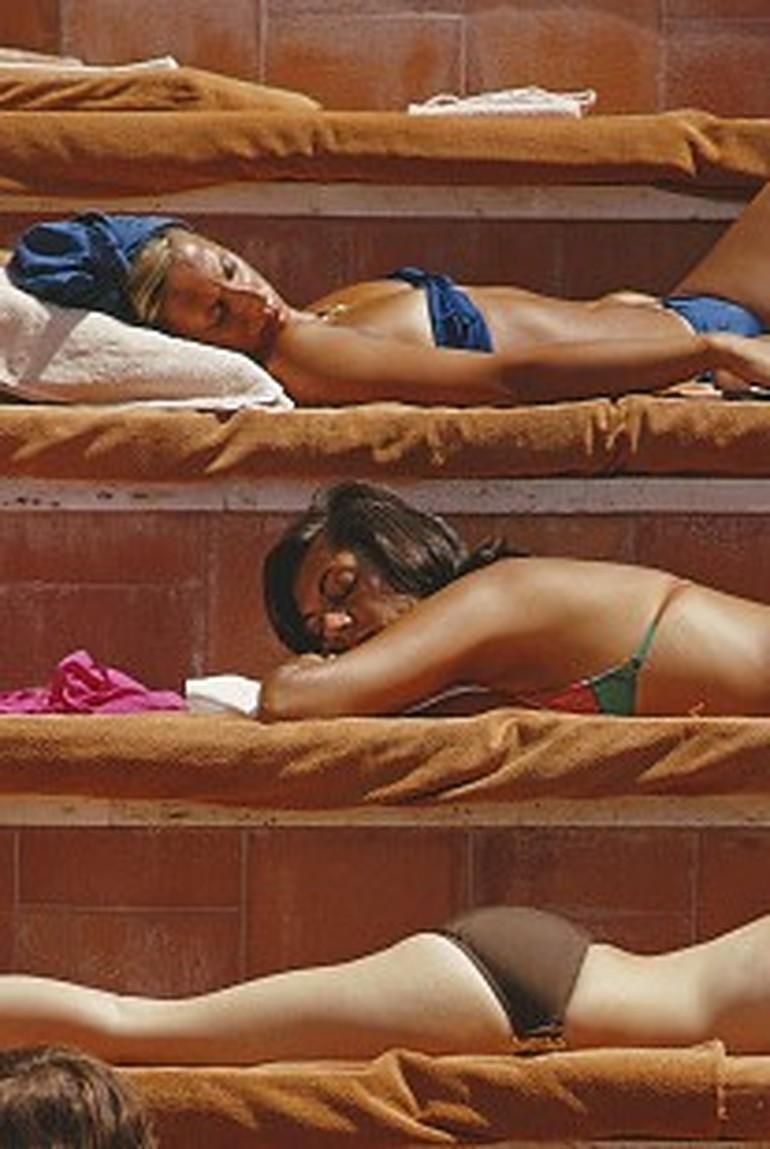 Slim Aarons Sunbathing In Capri, 1974   Sunbathers On French Island Of Capri Summer Bronzing photo furniture