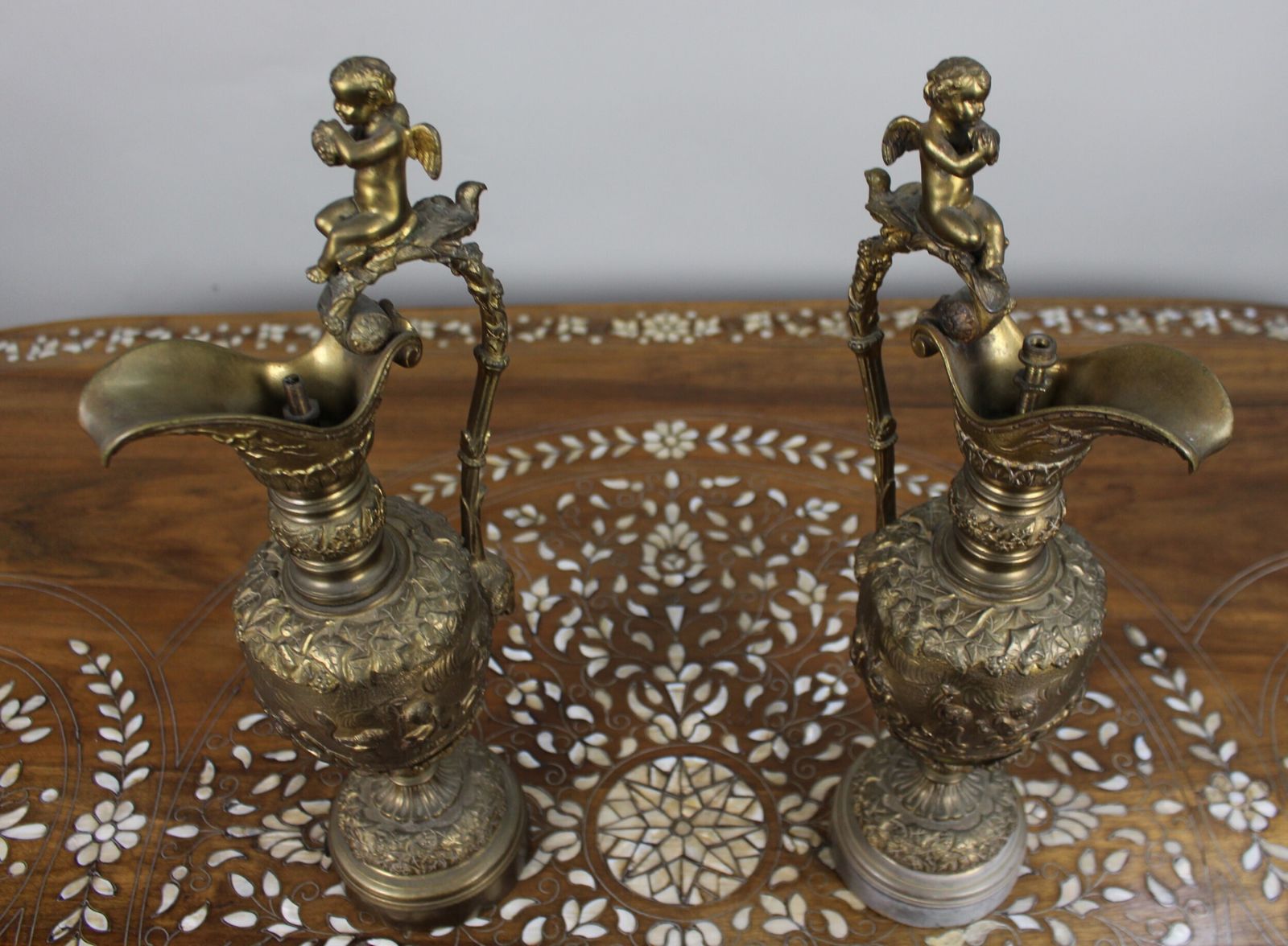 photo vintage Pair Of 19th Century French Gilt Bronze Bacchanalian Ewers With Cherubs