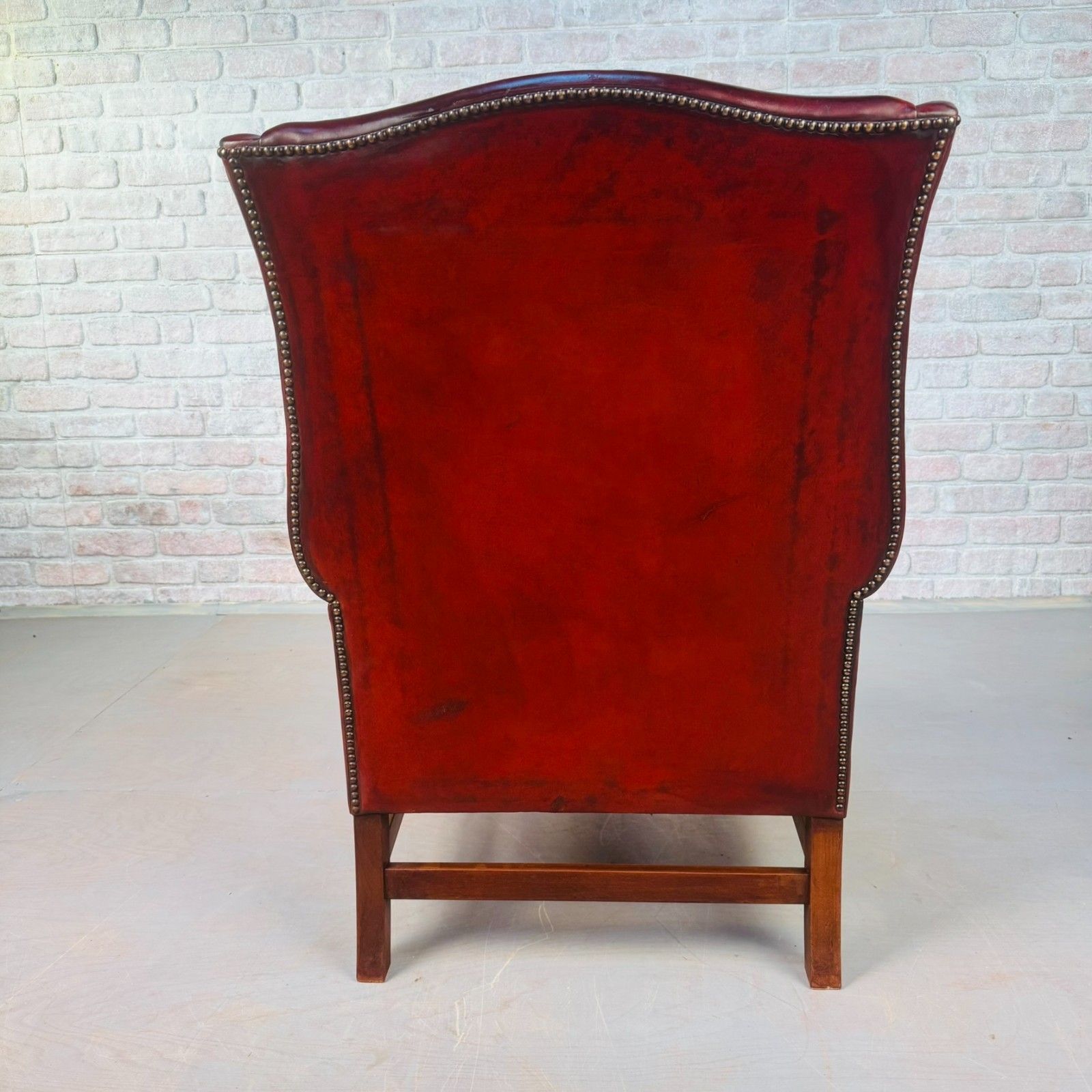 photo furniture Vintage English Chestnut Brown Deep Red Leather Wingback Chair #A844