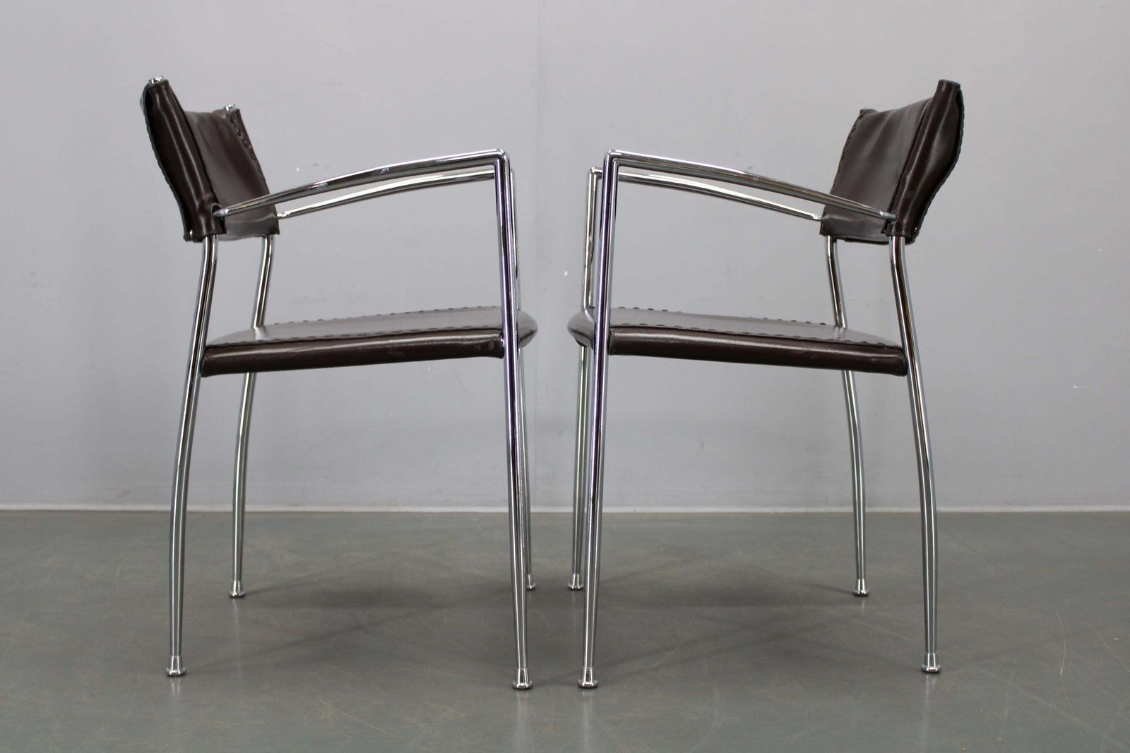 photo buy Set Of Six Italian Leather And Chrome Armchairs By Arper