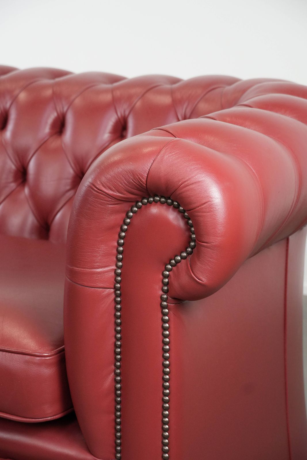 photo for sale Beautiful English 2.5 Seater Cowhide Chesterfield Sofa In A Stunning Red Color.