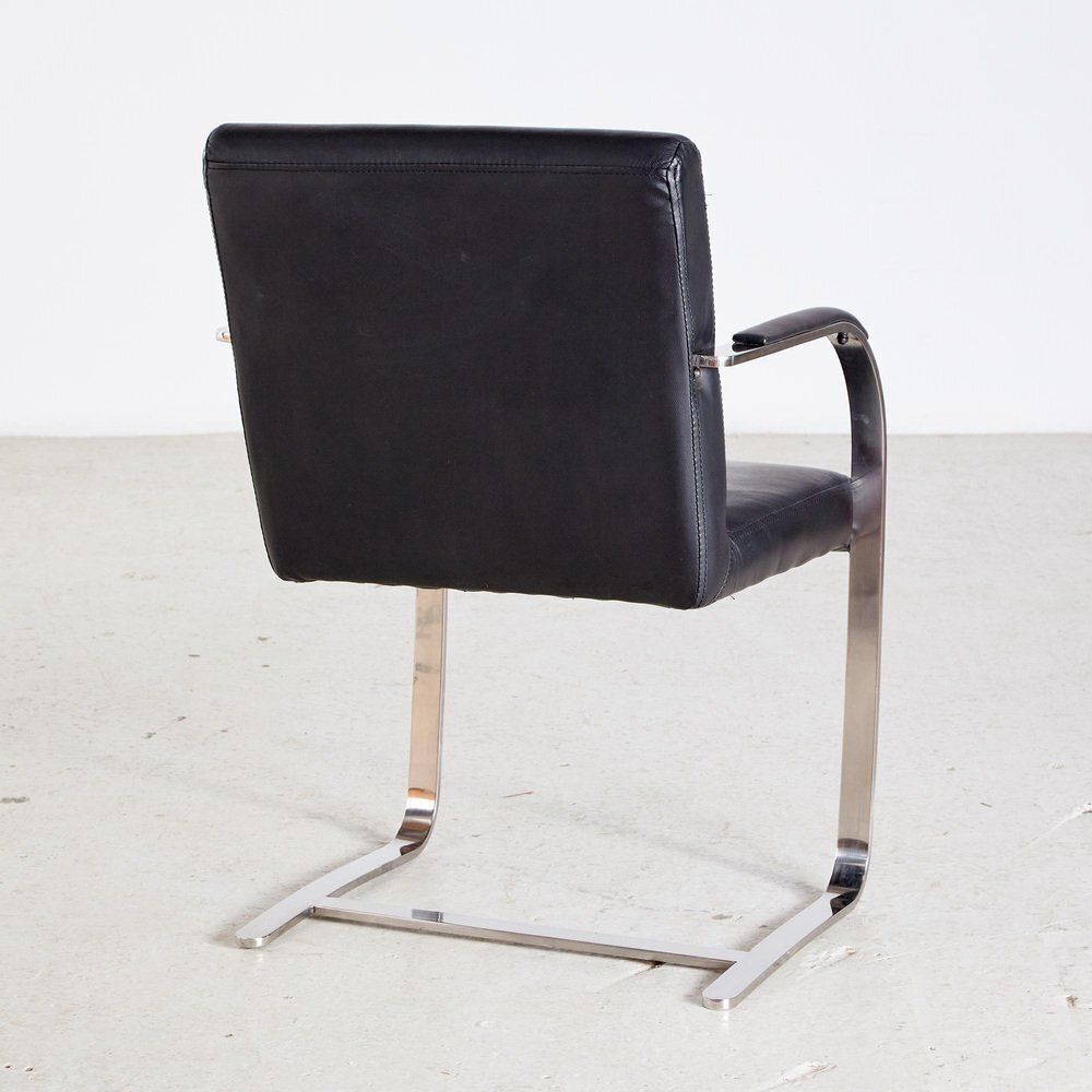 Steel Armchair With Leather Upholstery photo for sale