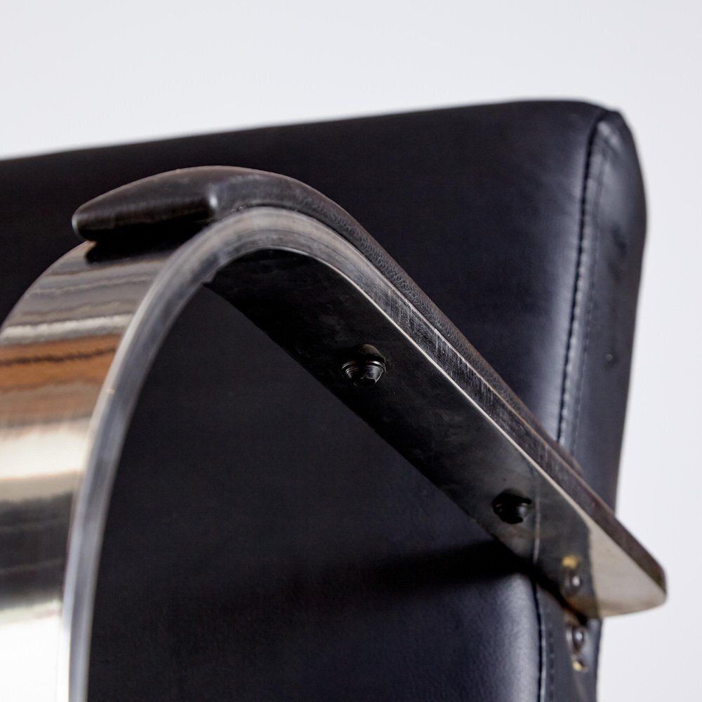 photo furniture Steel Armchair With Leather Upholstery