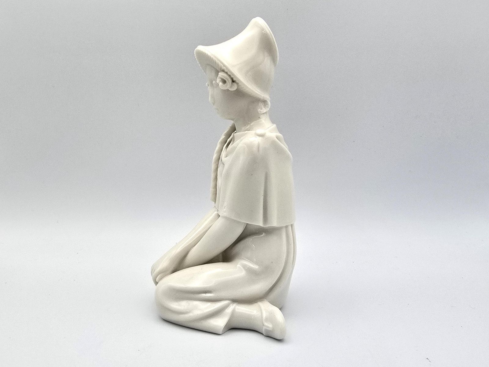 Royal Copenhagen Seventeen Years Blanc De Chine Figurine – Arno Malinowski, Damaged photo furniture