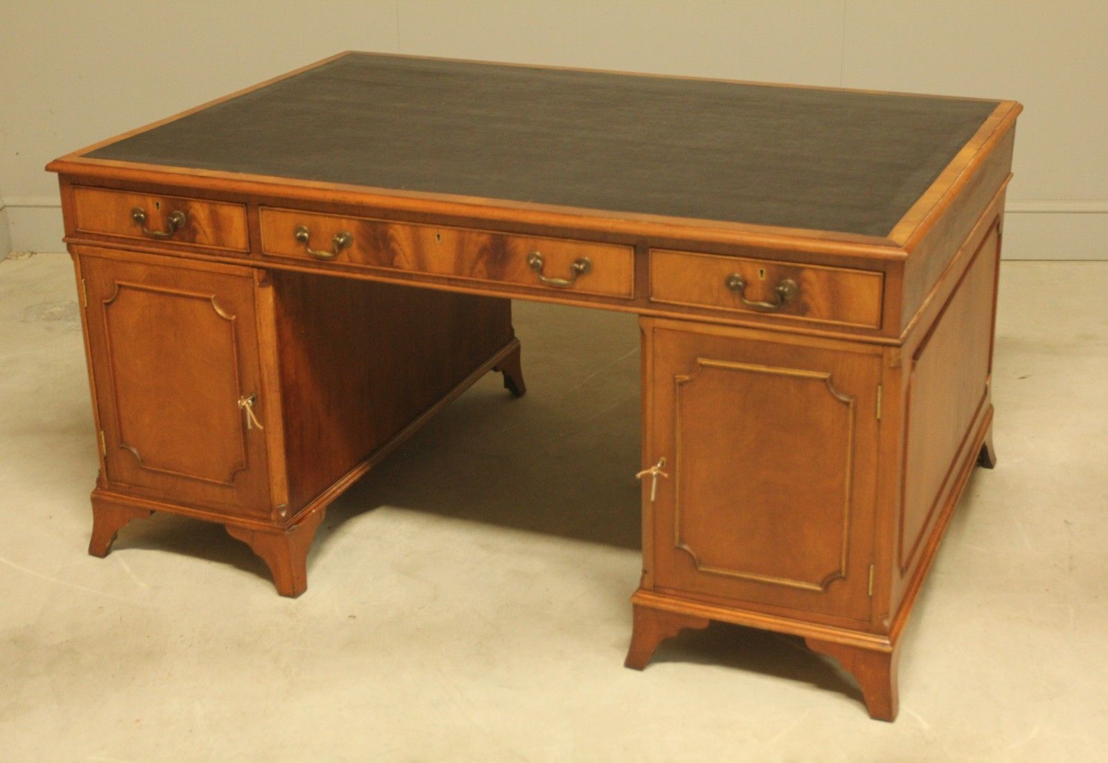 photo for sale An Early 20th Century Curl Mahogany Partners Desk