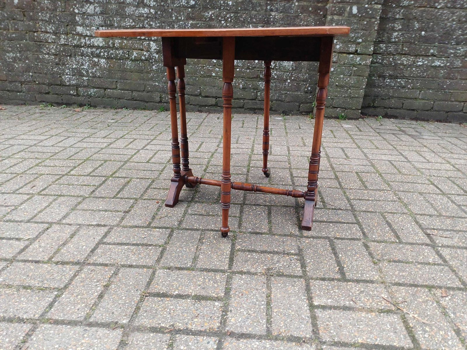 295.0 Victorian Mahogany Sutherland Table Drop Leaf Occasional Side Table Sofa Table Turned Base Brass Porcelain Castors Antique photo