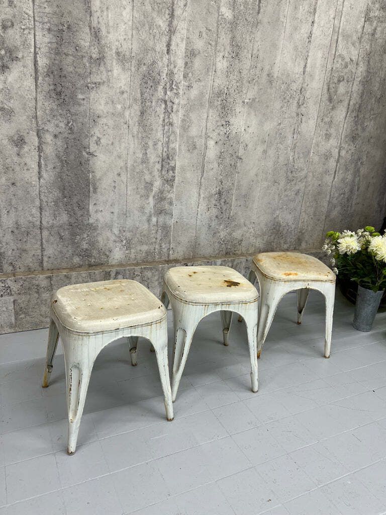 Set Of Three Stacking 1930's Style Tolix Cream Coloured Metal Stools photo furniture