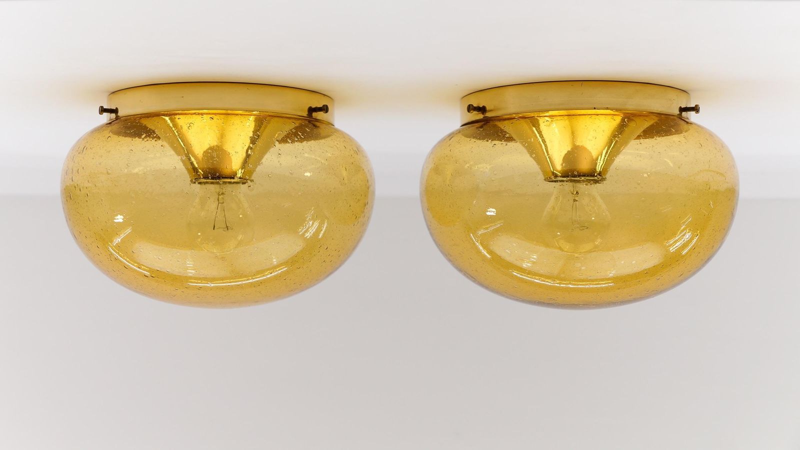 photo for sale Pair Of Amber Gold With Air Bubble Inclus Wall Lamps / Flush Mount Lights, 1960s
