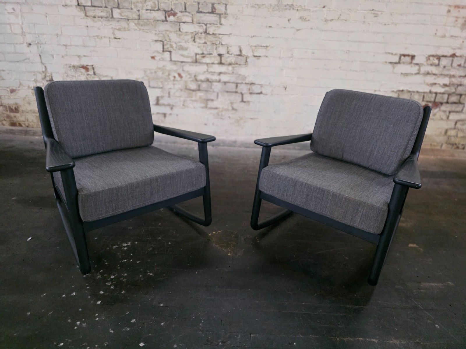 Pair Of Mid Century Style Rocking Chairs With Arms