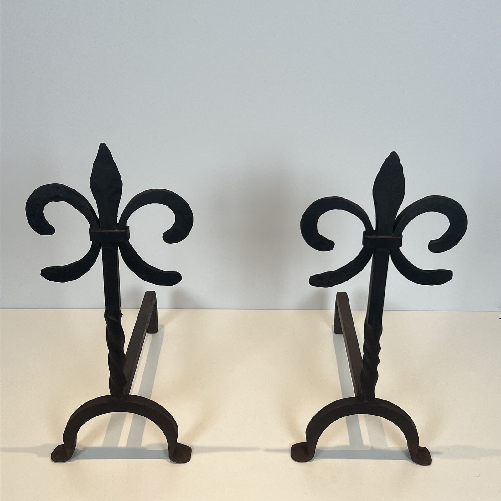 Pair Of Wrought Iron Andirons With Fleur De Lis Design photo for sale