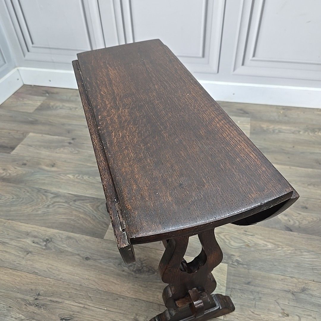 photo furniture Antique Drop Leaf Table Wooden Sofa Coffee Oval Top Carved Trestle Base Oak
