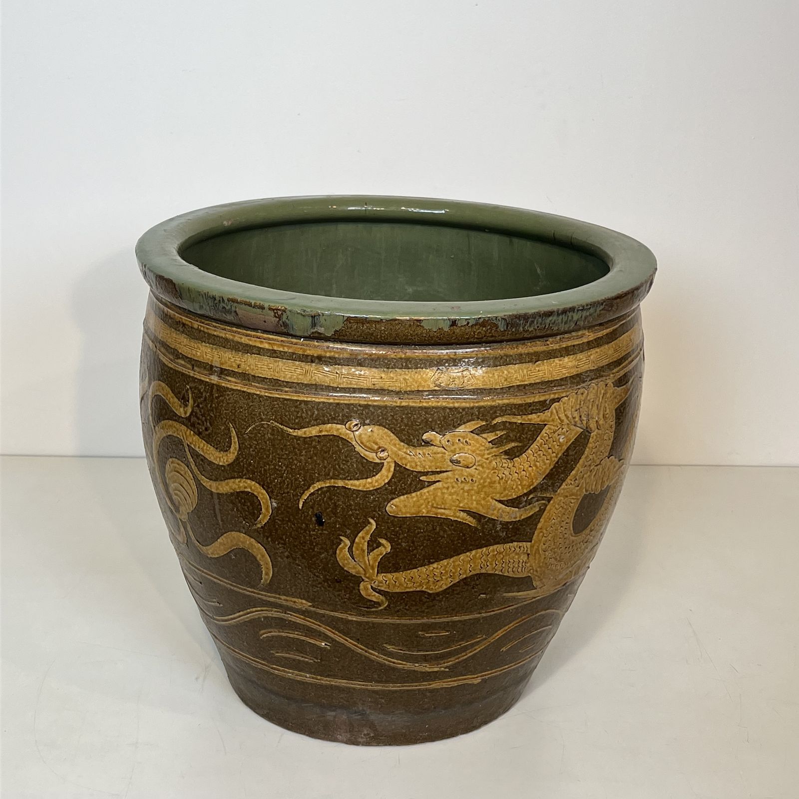 photo for sale Large Chinese Glazed Terracotta Planter Decorated With Dragons