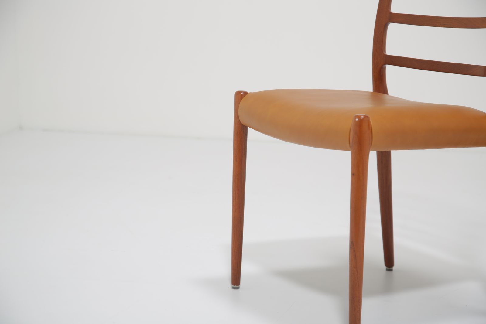 Niels Otto Møller Model 82 Dining Chairs: Set Of 8 In Solid Teak And Tan Leather For J.L. Møllers, 1960s photo furniture
