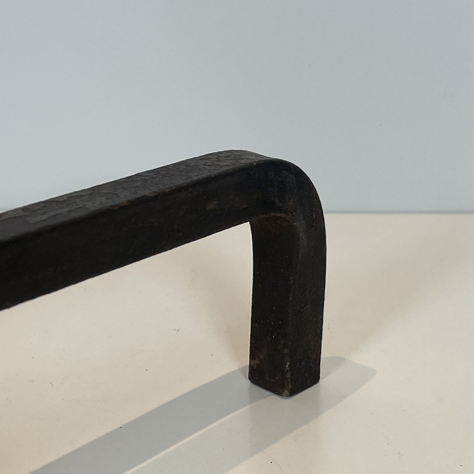 photo for sale Pair Of Modernist Andirons In Steel, Wrought Iron And Brass By Jacques Adnet