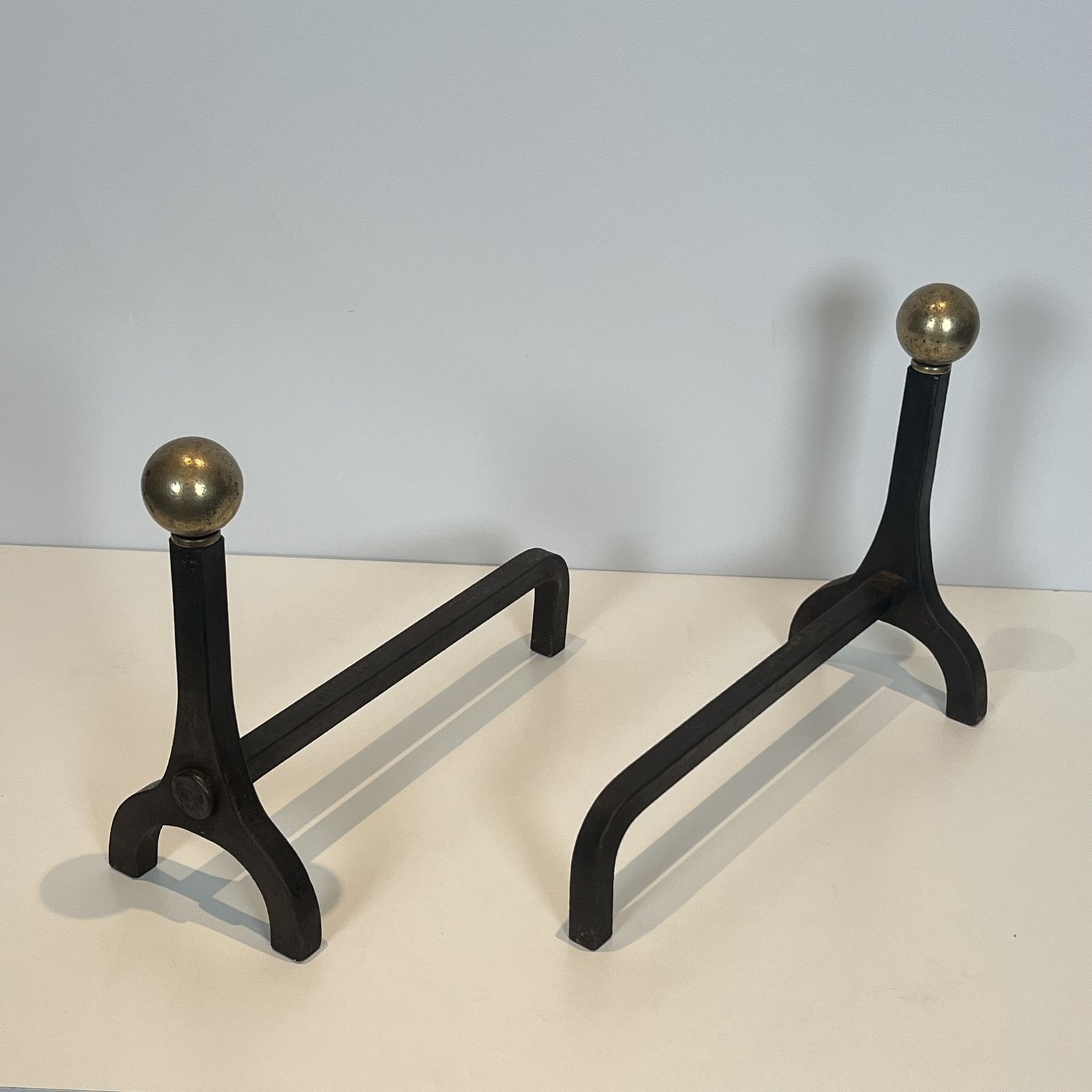 photo buy Pair Of Modernist Andirons In Steel, Wrought Iron And Brass By Jacques Adnet