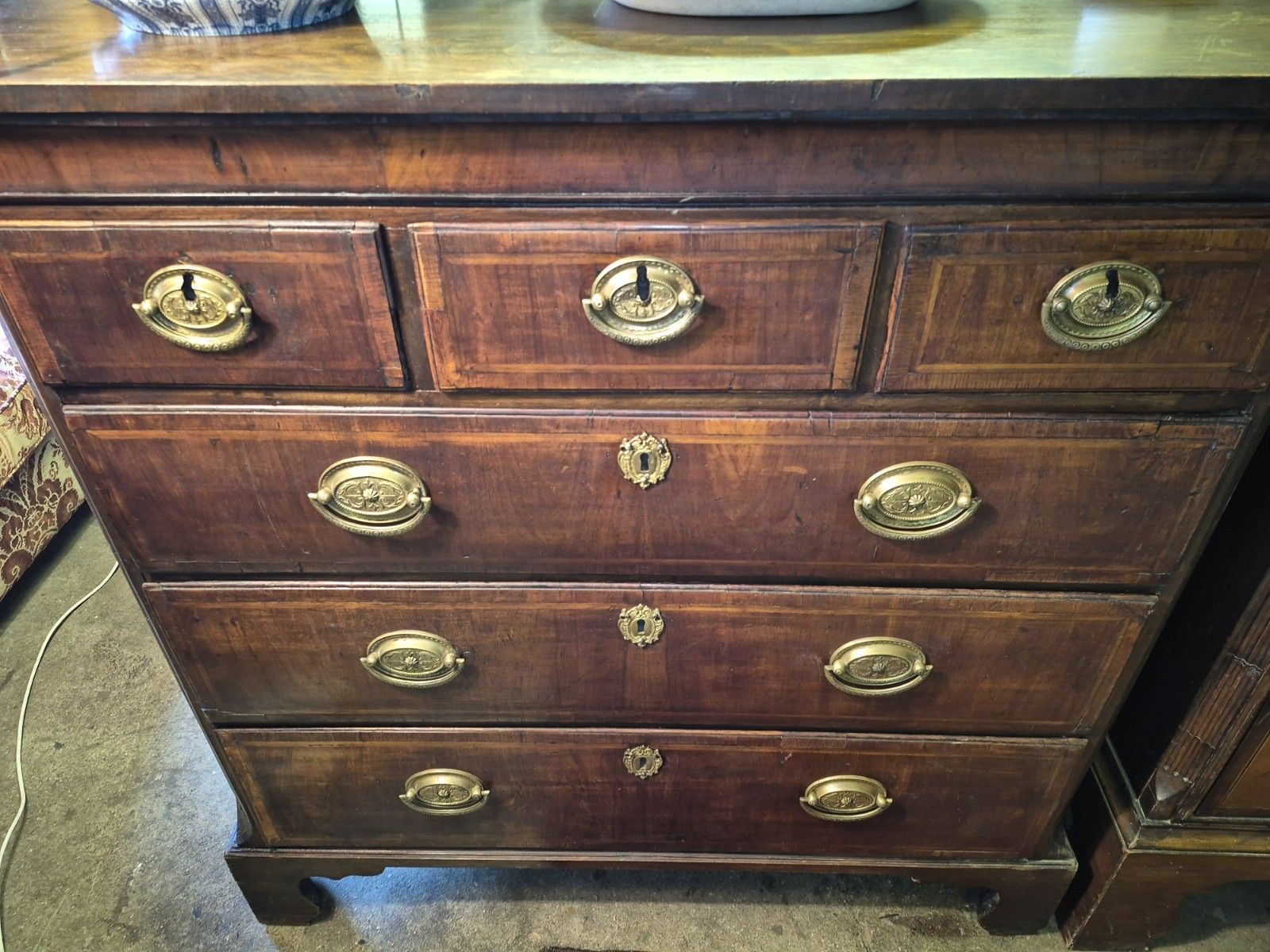 A Great George II Crossbanded Figured Walnut Chest Of Drawers On Bracket Feet photo furniture