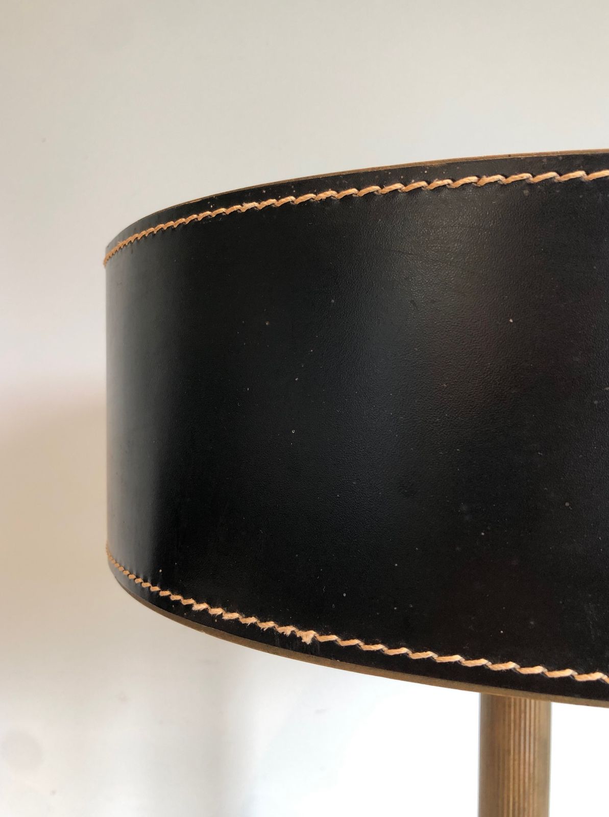 photo for sale Black Leather And Brass Desk Lamp In The Style Of Jacques Adnet