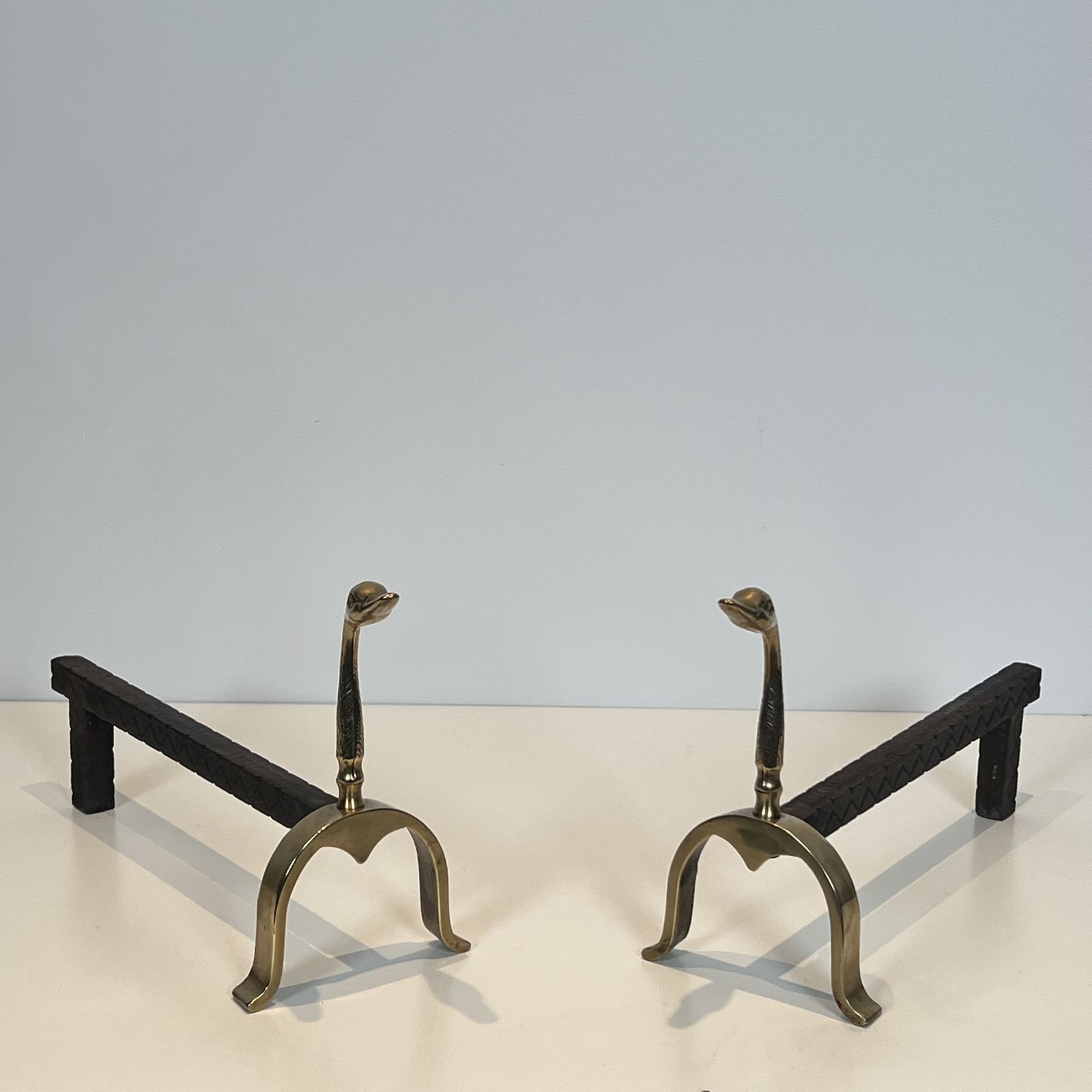 Pair Of Brass Andirons With Ducks. In The Style Of Maison Jansen
