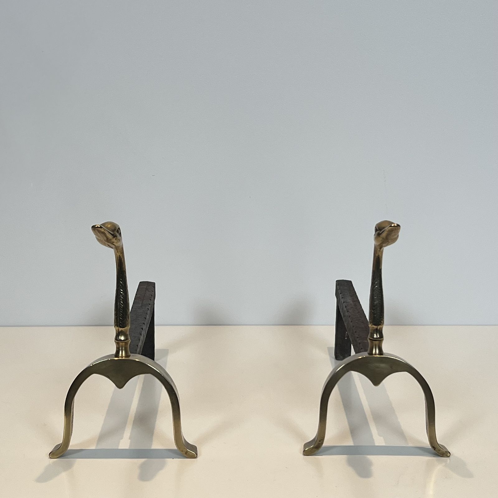 Pair Of Brass Andirons With Ducks. In The Style Of Maison Jansen photo for sale