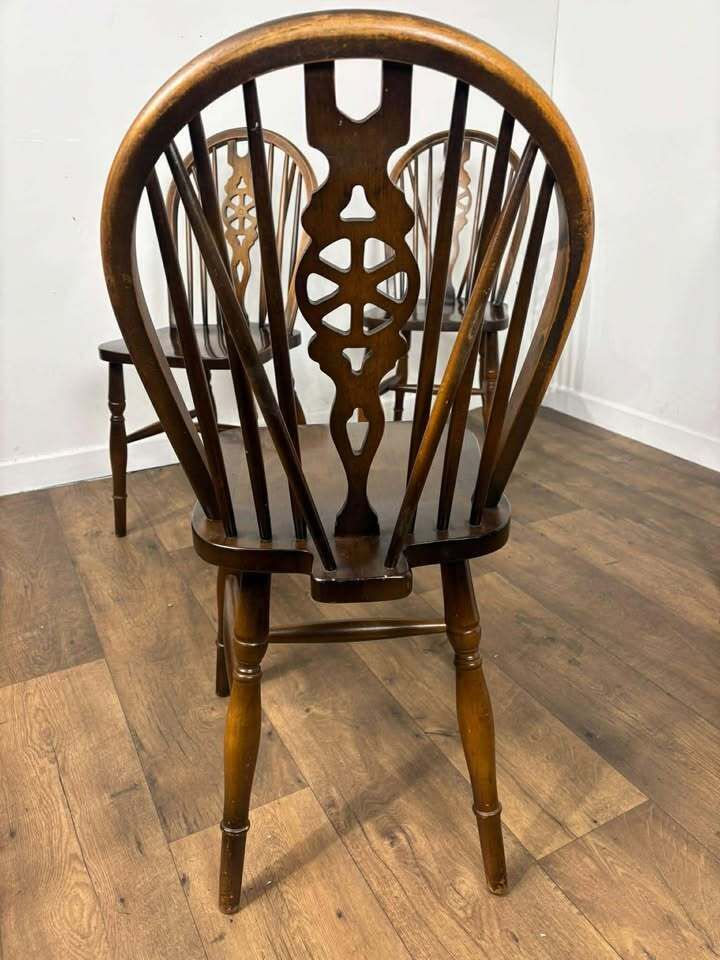 Furniture Vintage Set Of Four Dark Oak Wheel Back Chairs photo
