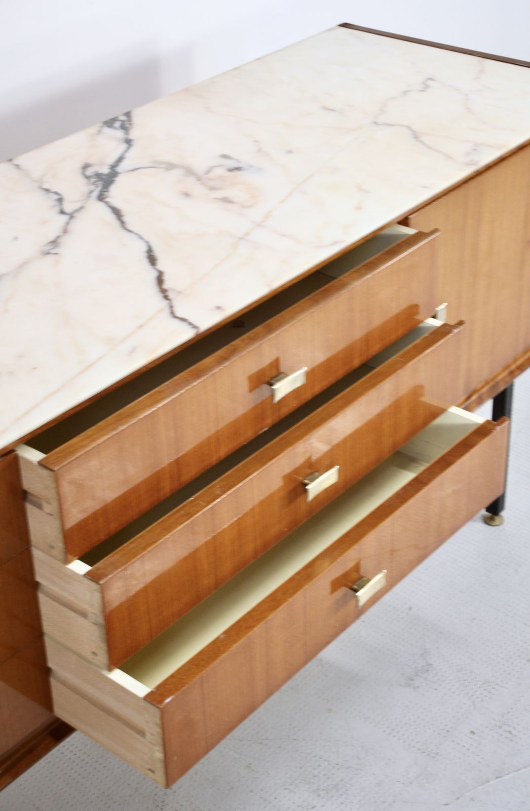 photo furniture Italian Midcentury Sideboard In Teak, Carrara Marble, Brass And Steel Manufactured In Cantu.