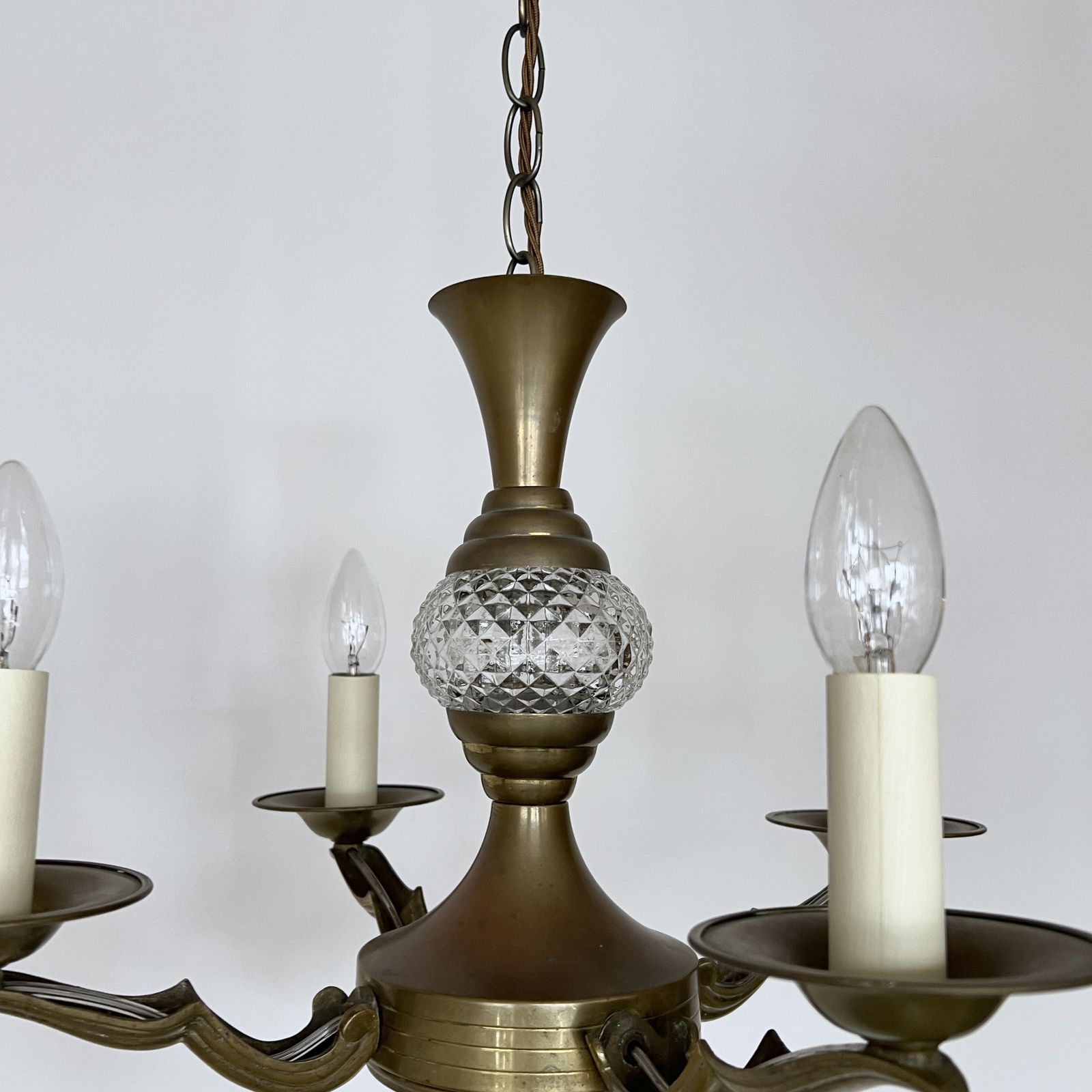 Brass Four Arm Chandelier With Faceted Glass Stem Detail photo vinterior