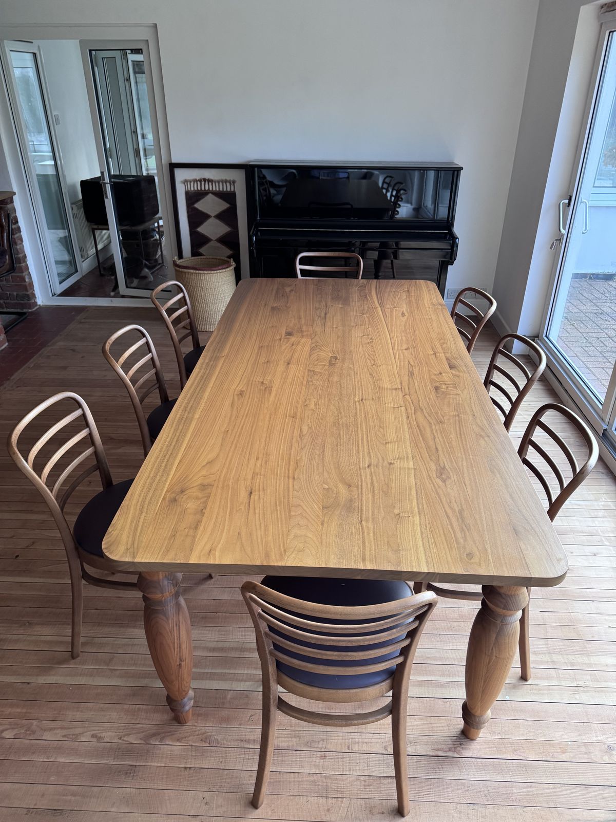 Benchmark Mrs B Dining Table In Walnut Designed By Russel Pinch With 8 Leather Upholstered Vienna Dining Chairs