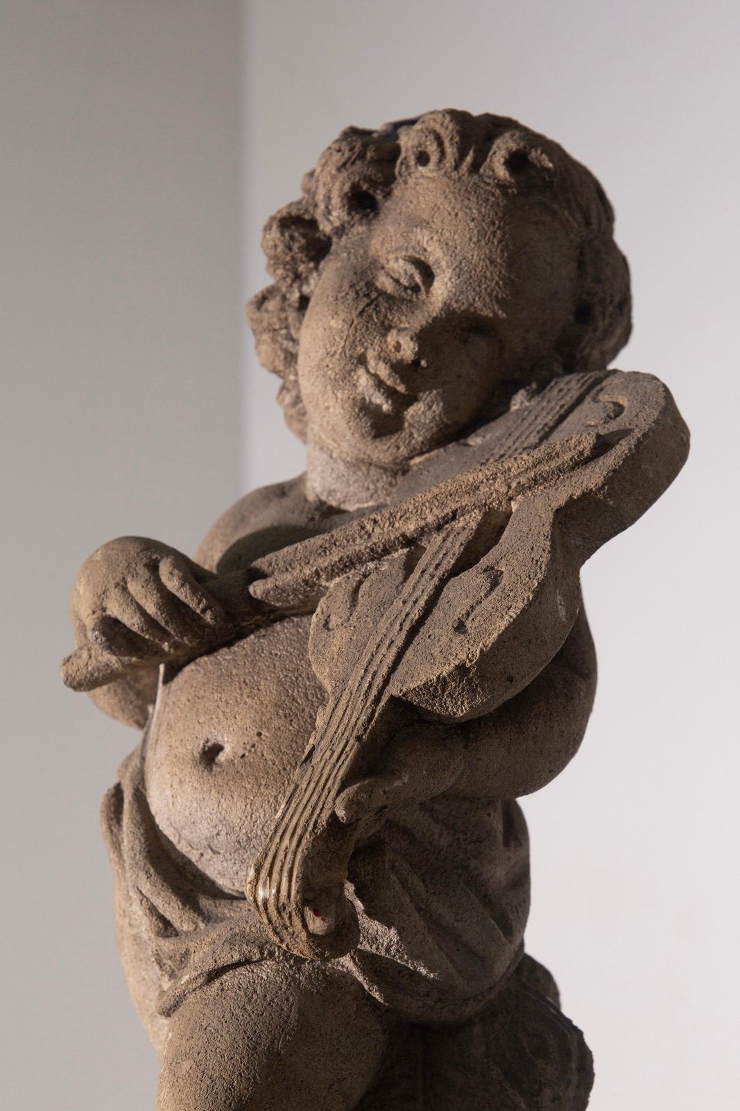 Elegant Italian Musical Cherub Statue In Stone For The Garden photo for sale