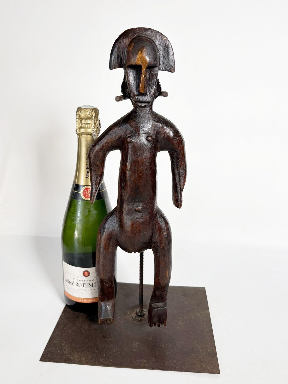 African Sculpture Of A Man In Wood, France, 1920 photo for sale