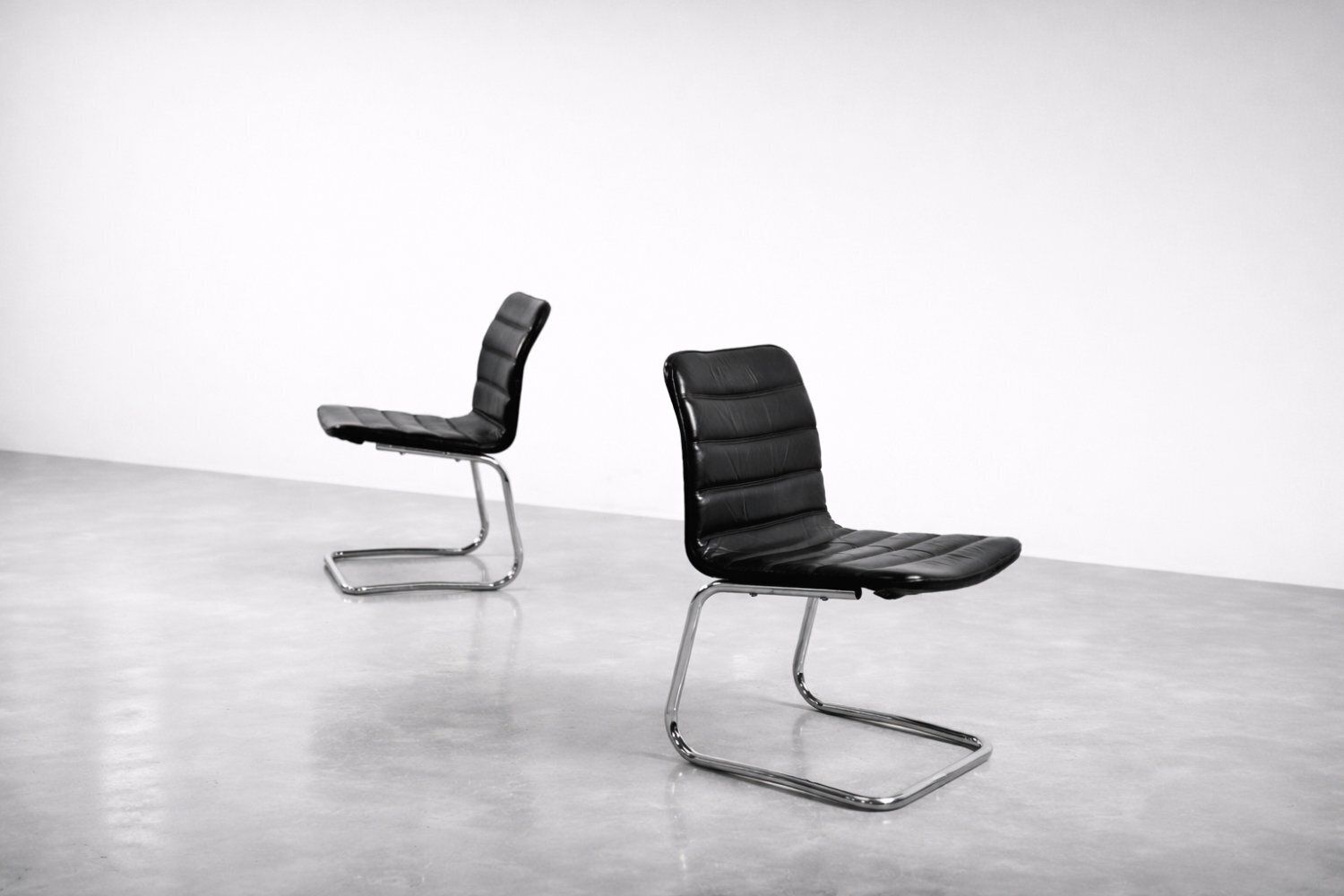 Vintage Chrome And Black Leather Club Chairs From Pol International, 1960s, Set Of 2